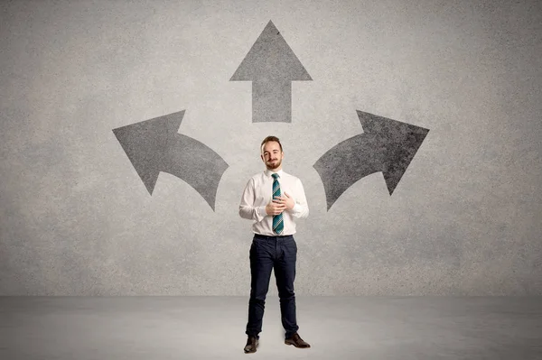 Businessman standing with three arrows — Stock Photo, Image