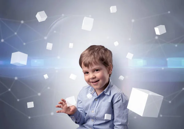 Enfant mignon avec des cubes lumineux autour — Photo