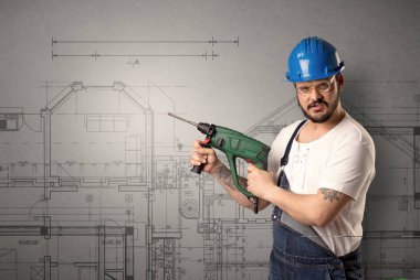 Çalışan teknik çizim ile.