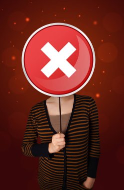 Tutan kadın x işareti