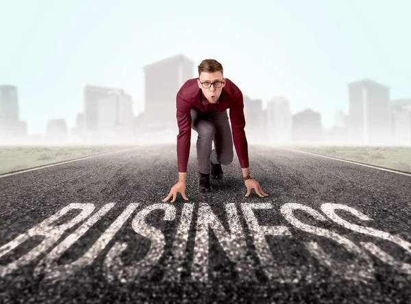 Businessman at start line — Stock Photo, Image