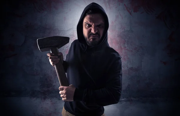 Armed assassin in an empty bloody room concept — Stock Photo, Image