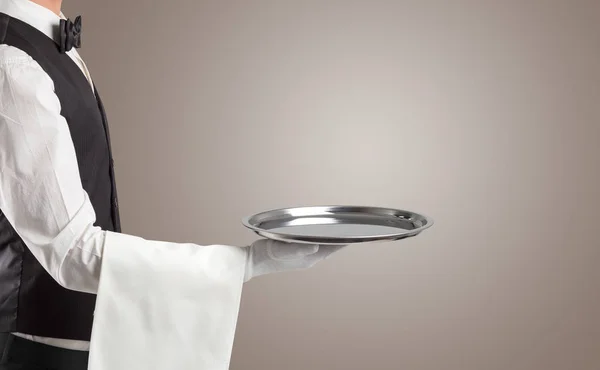 Waiter serving with white gloves and steel tray — Stock Photo, Image