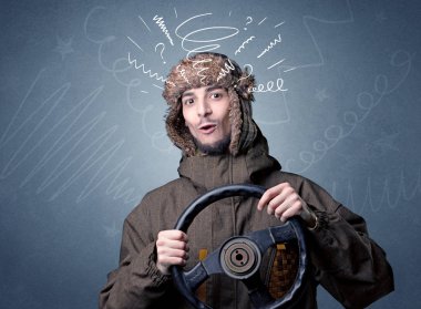 Elinde direksiyon tutan adam