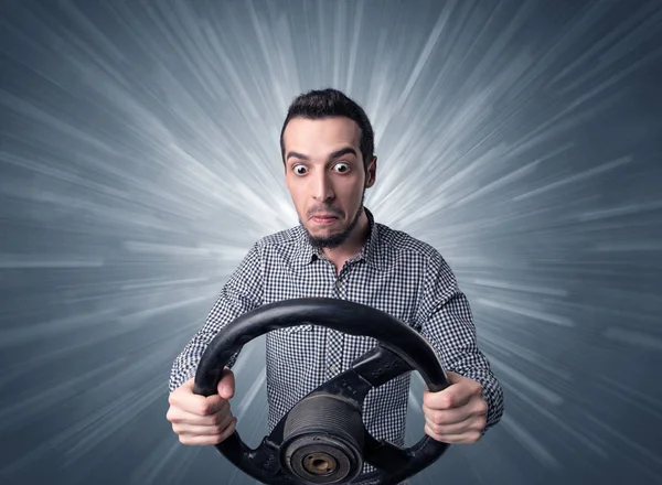 Man holding steering wheel — Stock Photo, Image