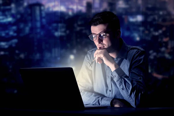 Businessman in the office at night — Stock Photo, Image