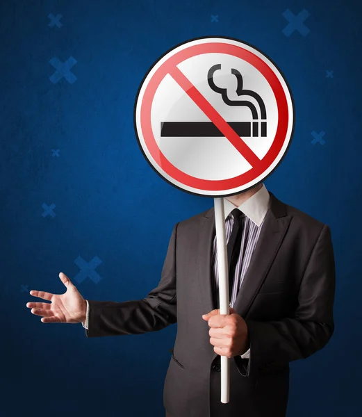 Businessman holding no smoking sign — Stock Photo, Image