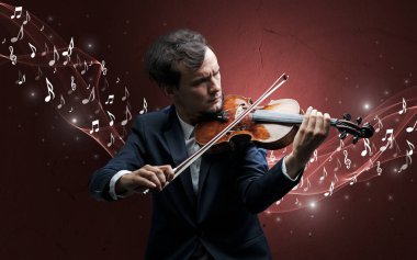 Yalnız besteci üzerinde keman çalıyor