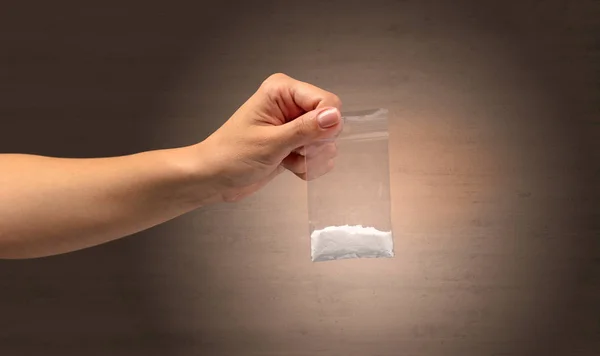 Dando drogas em saco plástico — Fotografia de Stock