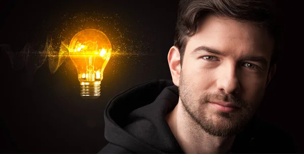 Portrait of a young businessman on dark background — Stock Photo, Image