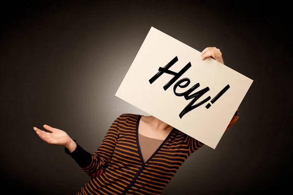 Woman holding paper with greeting — Stock Photo, Image