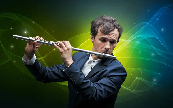 Flutist with colorful fabled concept — Stock Photo, Image