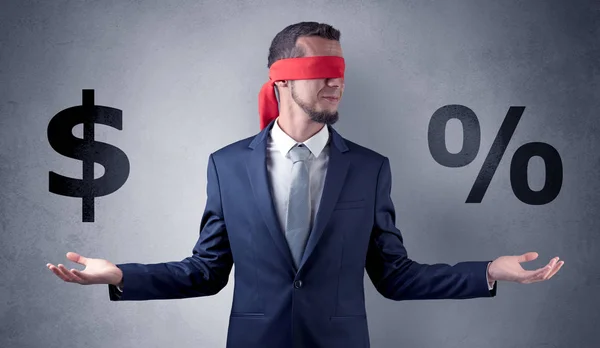 Man with ribbon on his eye holding dollar signs — Stock Photo, Image