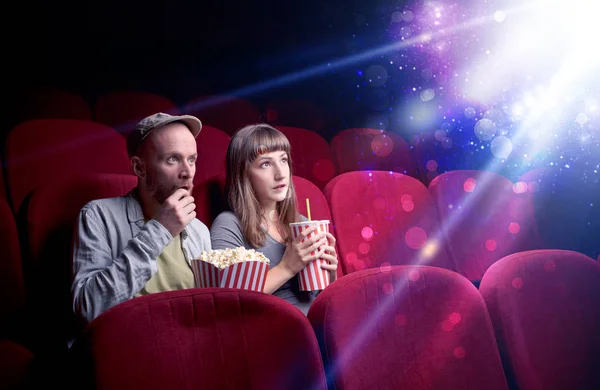 Romantic couple sitting at spectacle — Stock Photo, Image