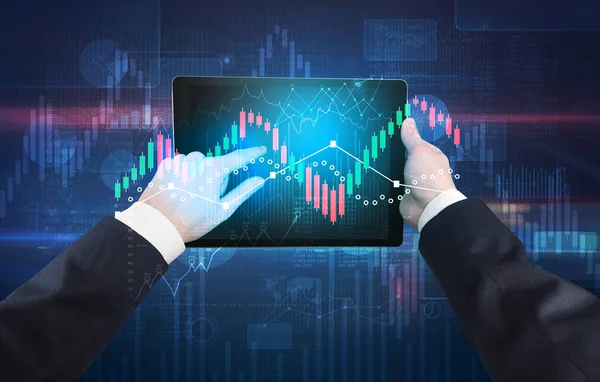 Hand holding tablet with global reports and stock market change concept — Stock Photo, Image