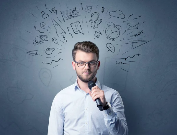 Businessman holding microphone — Stock Photo, Image