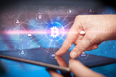 El bitcoin bağlantı ağı ve online kavramı ile tablet kullanma