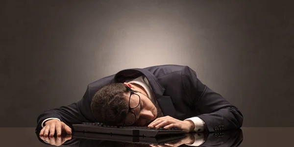 Businessman fell asleep at his workplace