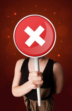 Tutan kadın x işareti