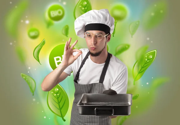 Bio bladeren concept en cook portret — Stockfoto