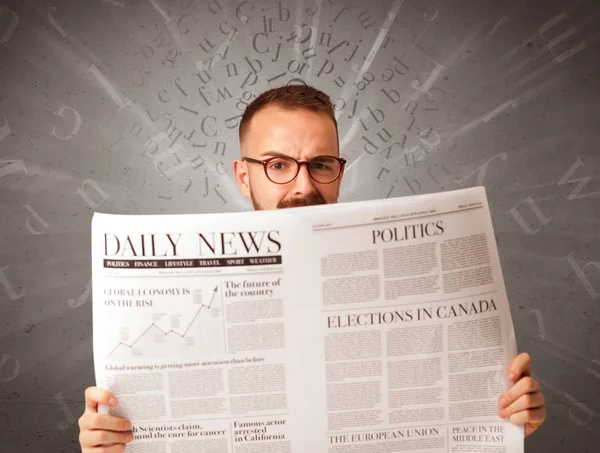 Businessman reading newspaper — Stock Photo, Image