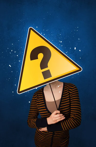 Woman holding question mark — Stock Photo, Image