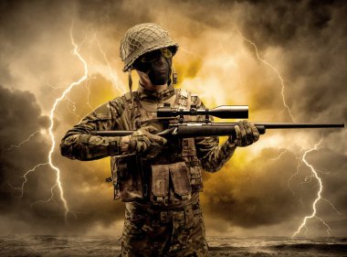 Silahlı asker anlaşılması güç bir havada duran