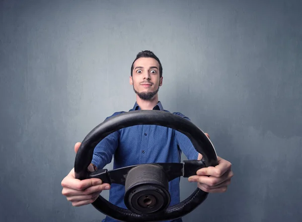 Man holding steering wheel — Stock Photo, Image