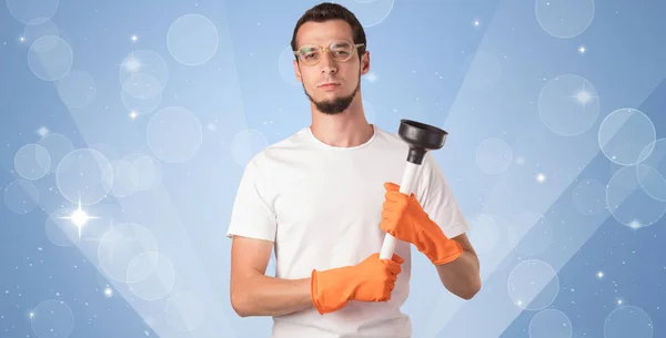 Glittered background with male housekeeper — Stock Photo, Image