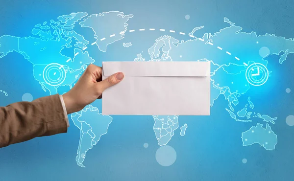 Hand holding envelope with global concept — Stock Photo, Image