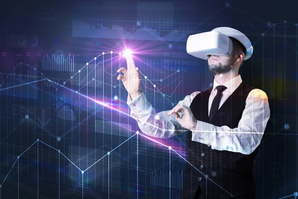 Man standing with VR goggles and graphs charts — Stock Photo, Image