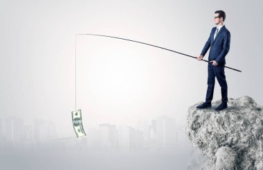 İşadamı Balık tutma Doları bir rock