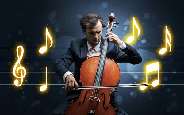 Young cellist with music sheet — Stock Photo, Image