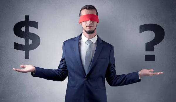 Man with ribbon on his eye holding dollar signs — Stock Photo, Image