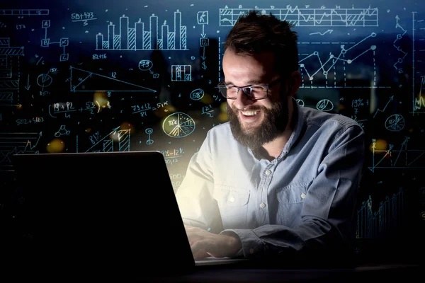 Businessman in the office at night — Stock Photo, Image