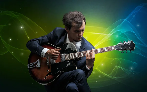 Guitarrista con colorido concepto legendario — Foto de Stock