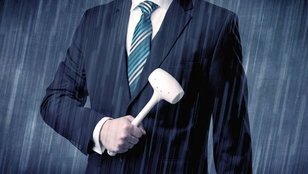 Employer standing with tool on his hand — Stock Photo, Image