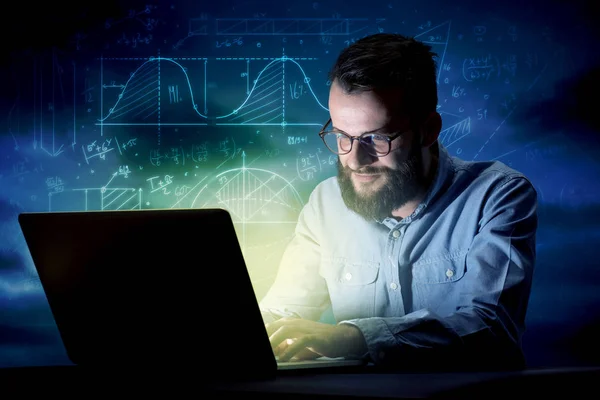 Businessman in the office at night — Stock Photo, Image