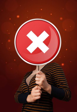 Tutan kadın x işareti