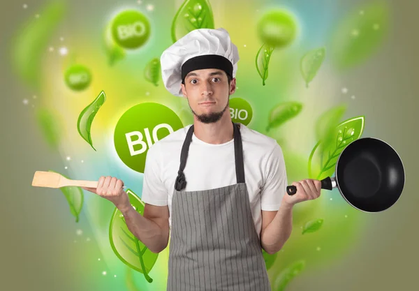 Bio bladeren concept en cook portret — Stockfoto