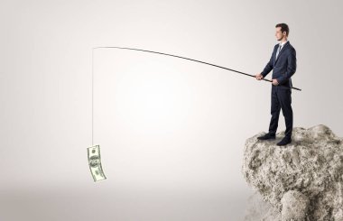 İşadamı Balık tutma Doları bir rock