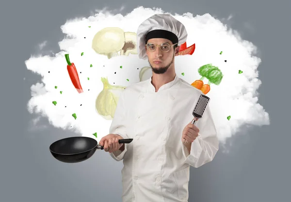 Légumes sur nuage avec cuisinier masculin — Photo