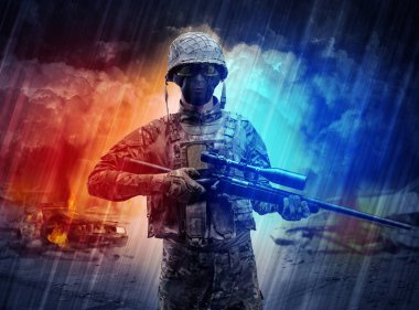 Silahlı asker toz fırtınanın ortasında duran