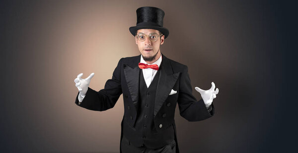 Magician holds something invisible 