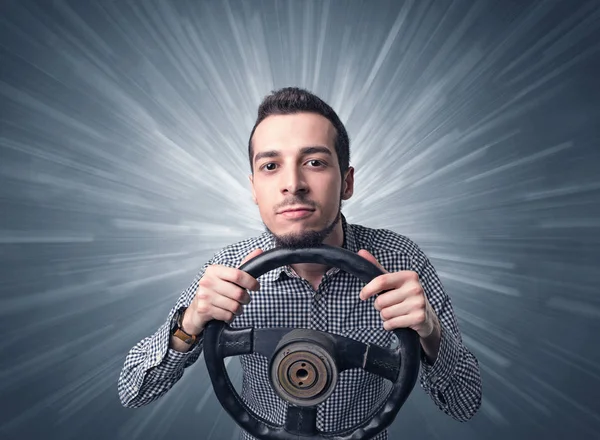 Man holding steering wheel — Stock Photo, Image