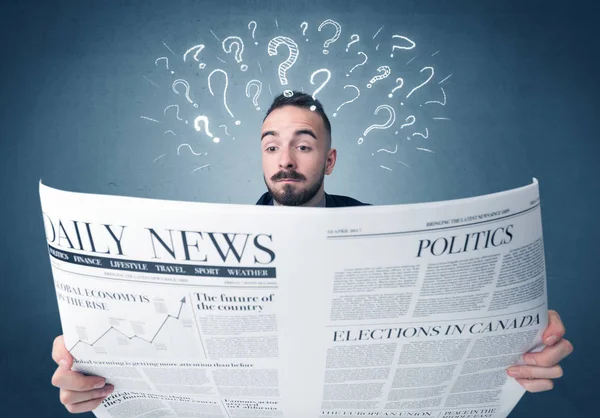 Businessman reading newspaper — Stock Photo, Image