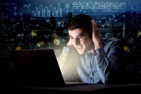 Businessman in the office at night — Stock Photo, Image