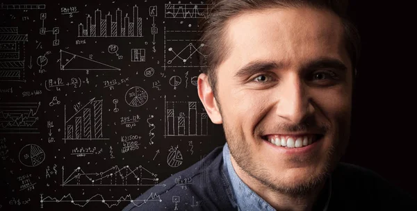 Portrait of a young businessman on dark background — Stock Photo, Image