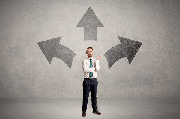 Charming Businessman Doubt Choosing Three Directions Front Grey Wall — Stock Photo, Image