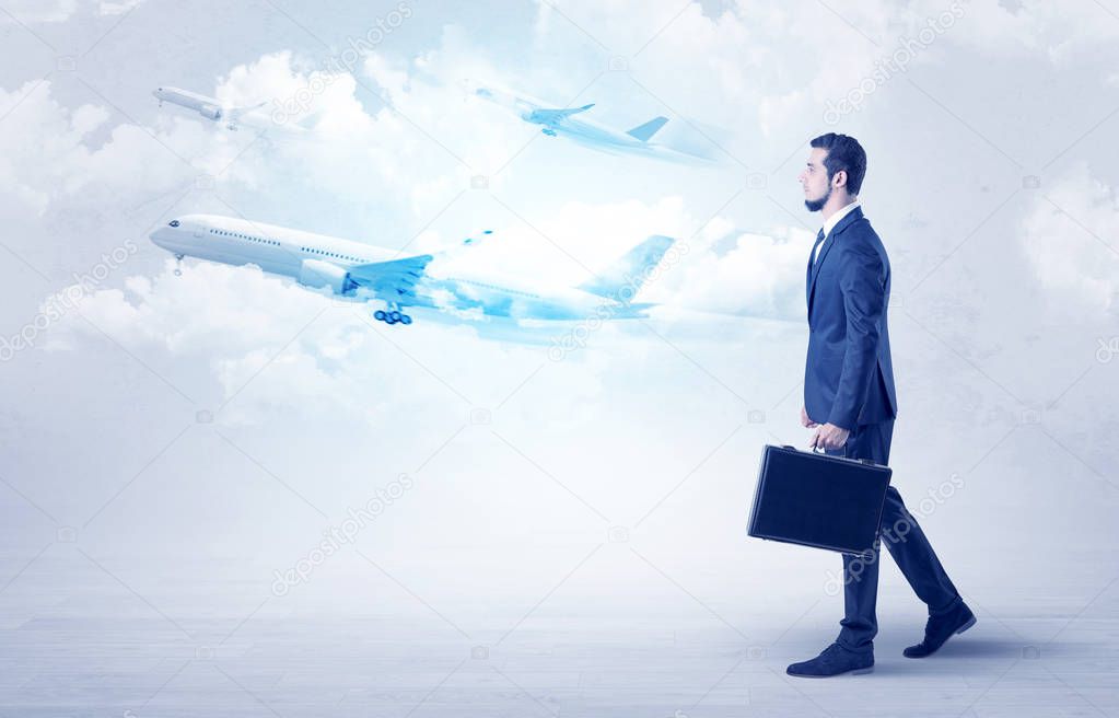 Businessman going somewhere with airplane